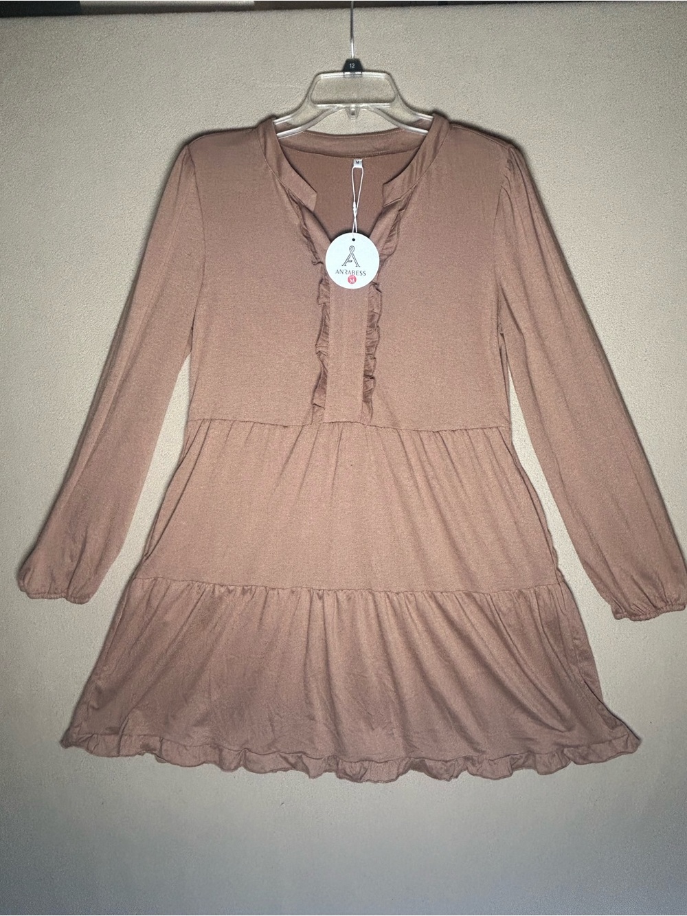 Babydoll Long-Sleeve Tiered Dress with Ruffle detail. Soft brown flowy fabric.